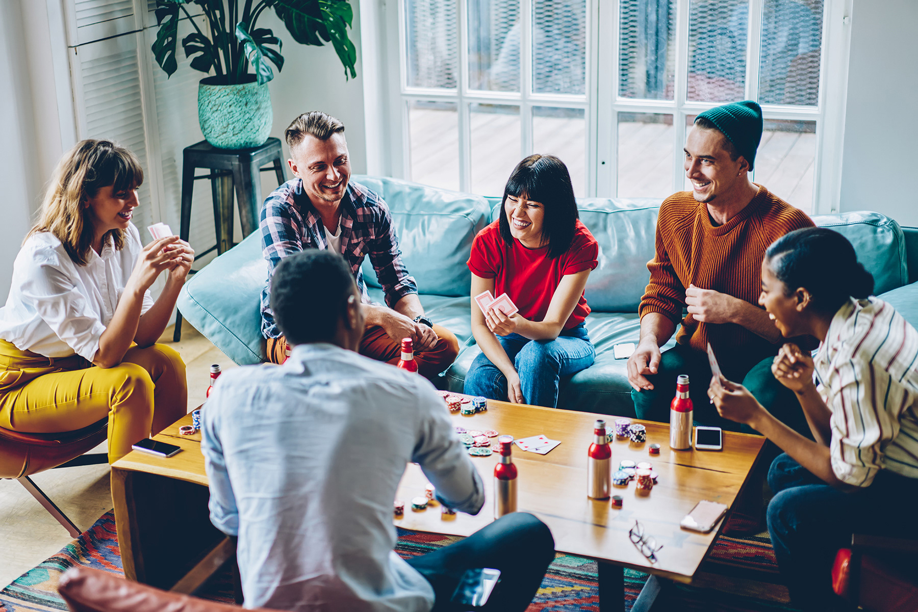 Before: stock image of group playing cards